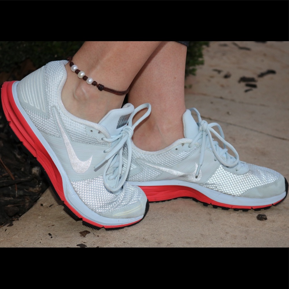Nike Pegasus 29 H2O repel coral color and grey.